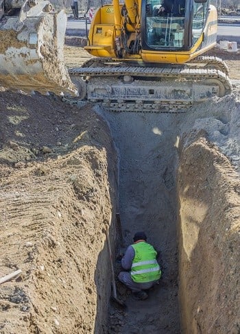 Worker working in trench 3