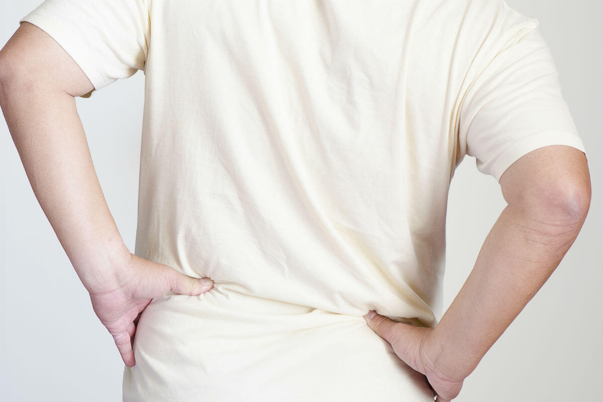 man with lower back pain