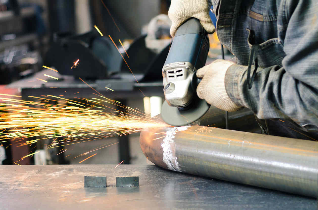 St. Louis worker using angle grinder