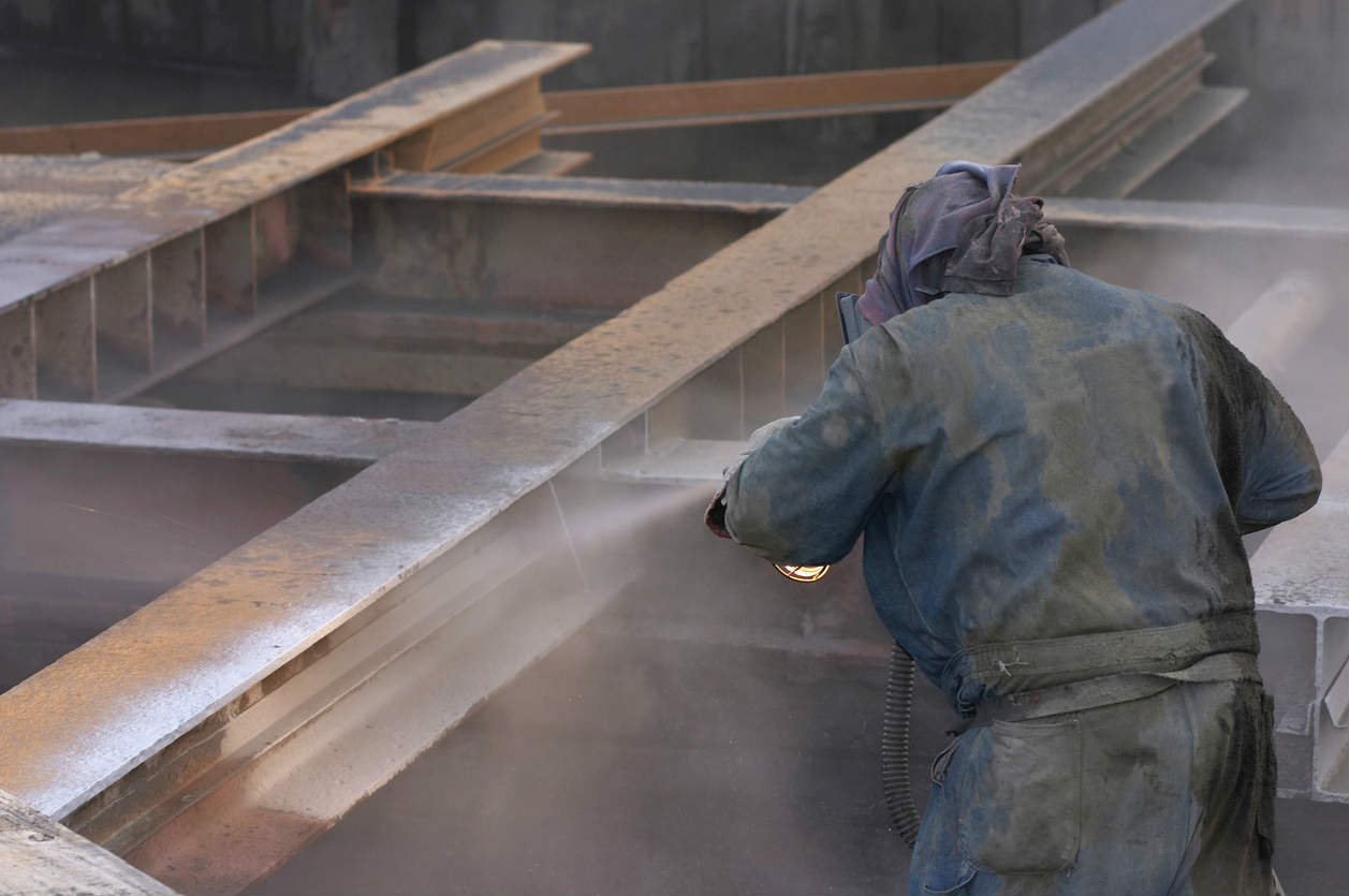 St. Louis worker sandblasting