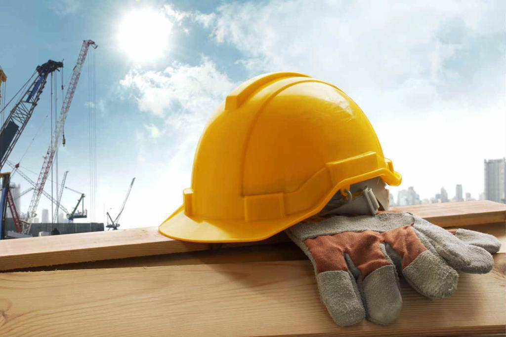 construction worker gloves and helmet