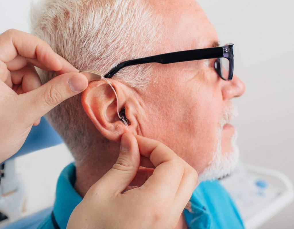 missouri worker with a hearing aid