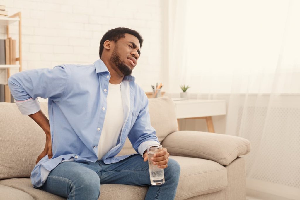 missouri worker on his couch with a back injury