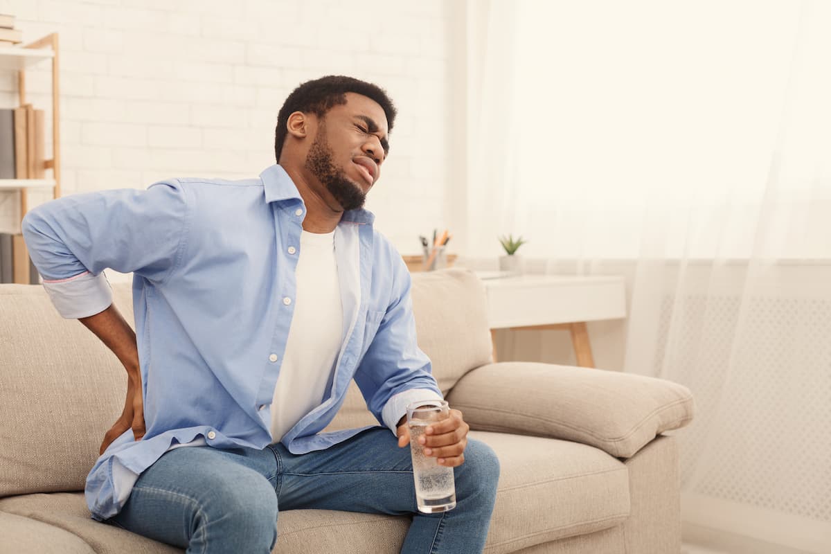 missouri worker on his couch with a back injury