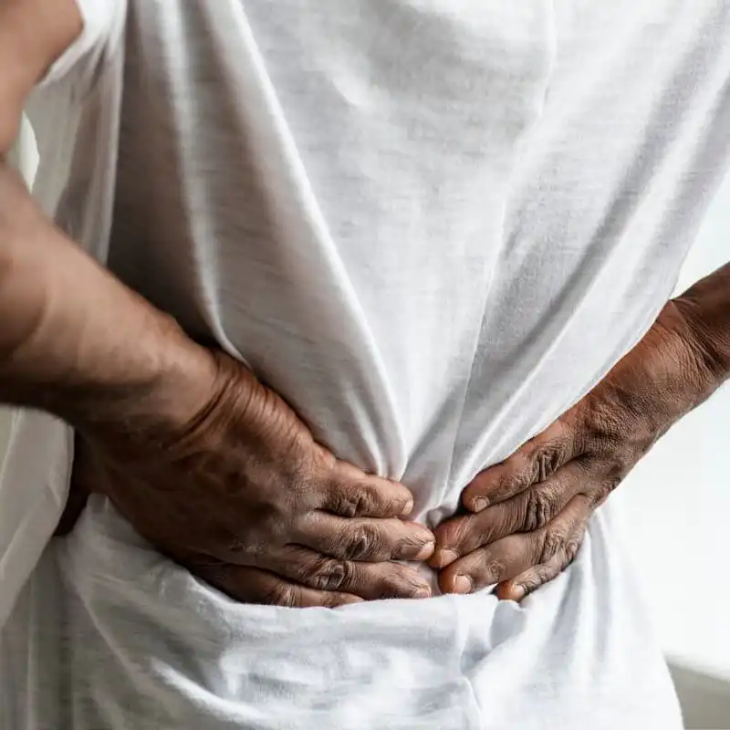 man with work-related back pain