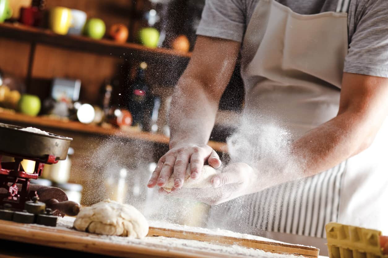 st. louis man working as a baker