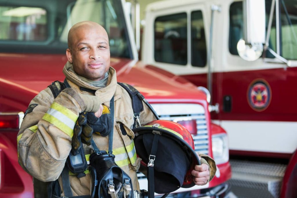 missouri firefighter in front of truck