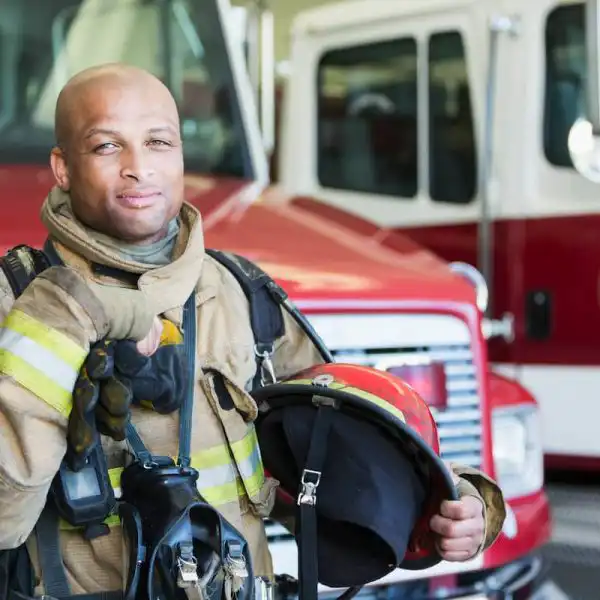 missouri firefighter in front of truck