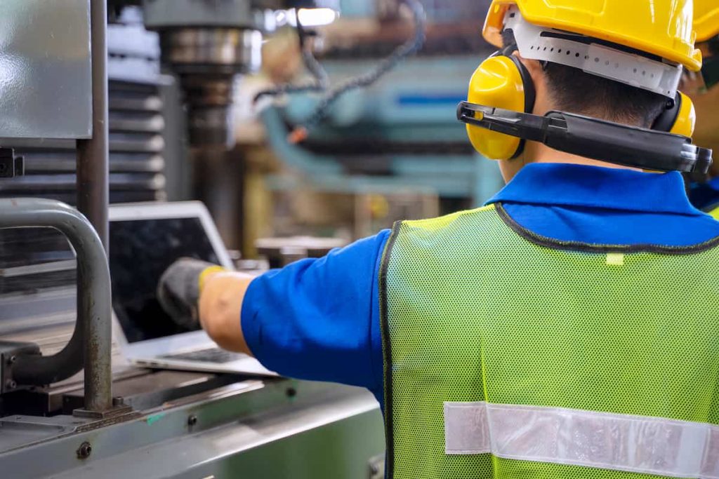 manufacturing worker with hearing protection