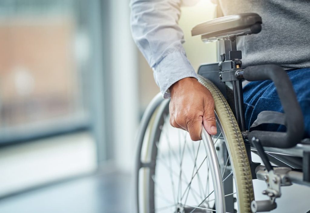 an injured worker in a wheelchair