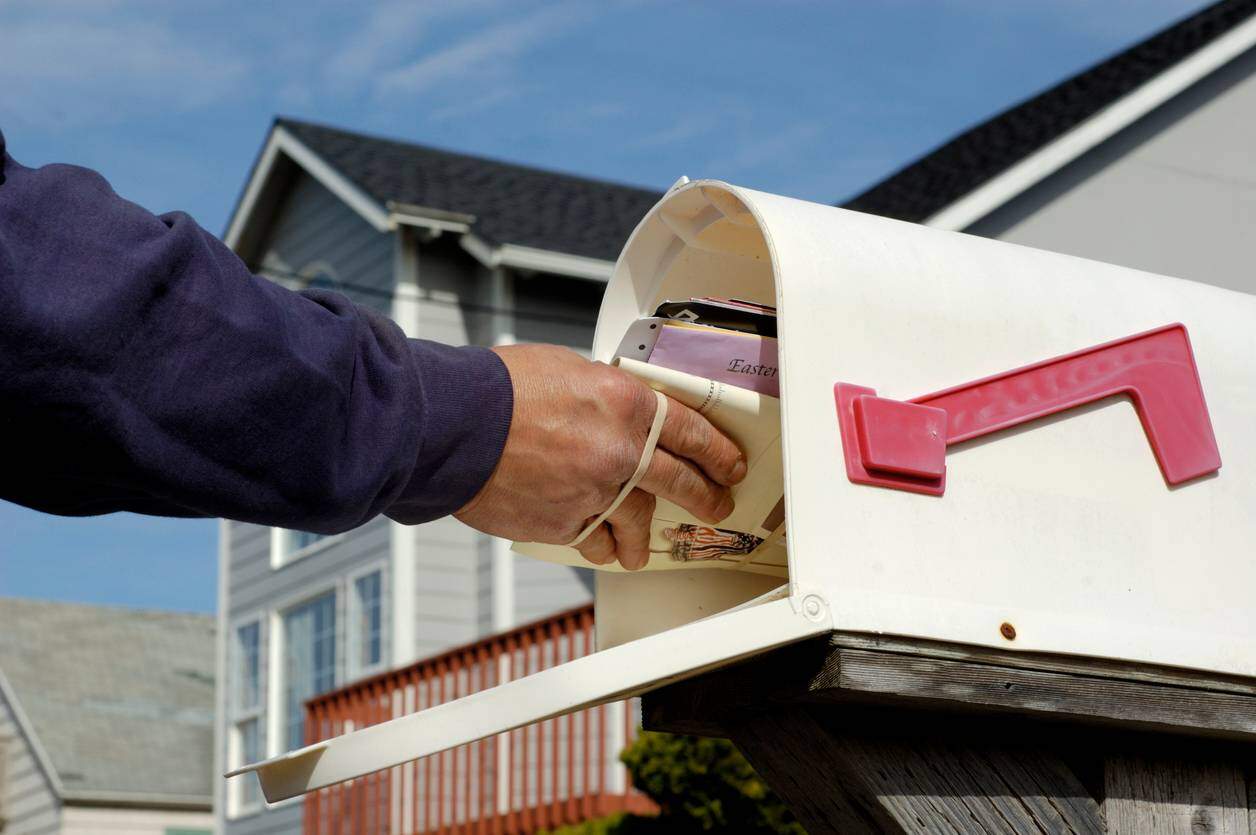 st louis mailman delivering mail