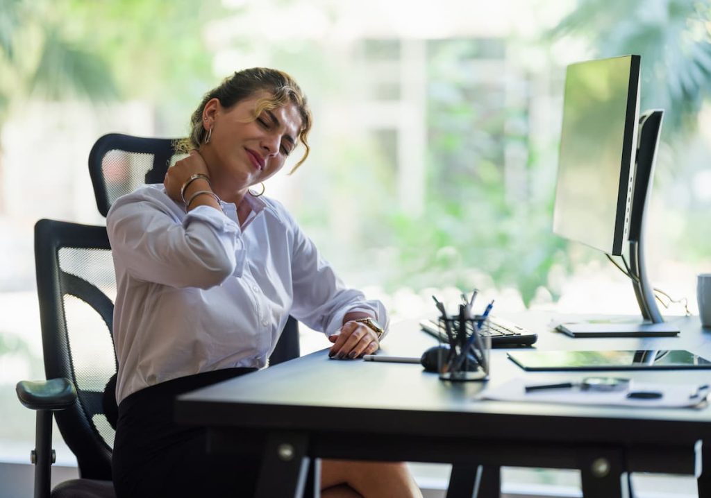 office worker with neck pain