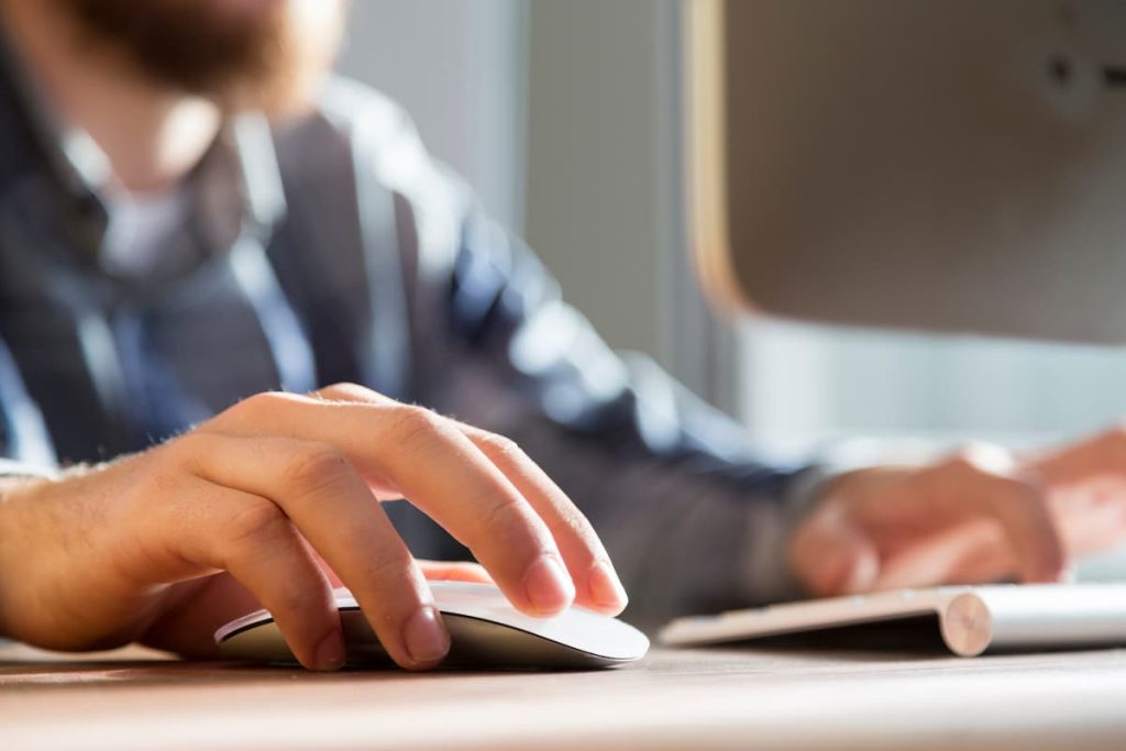 missouri worker using a keyboard and mouse