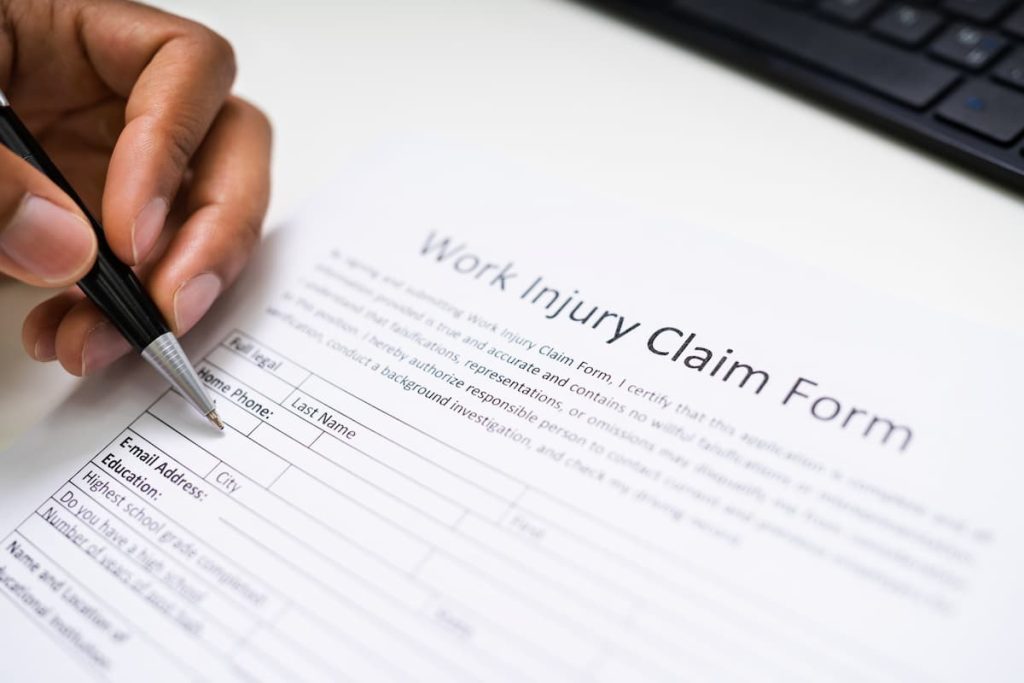 filing out a work injury claim form